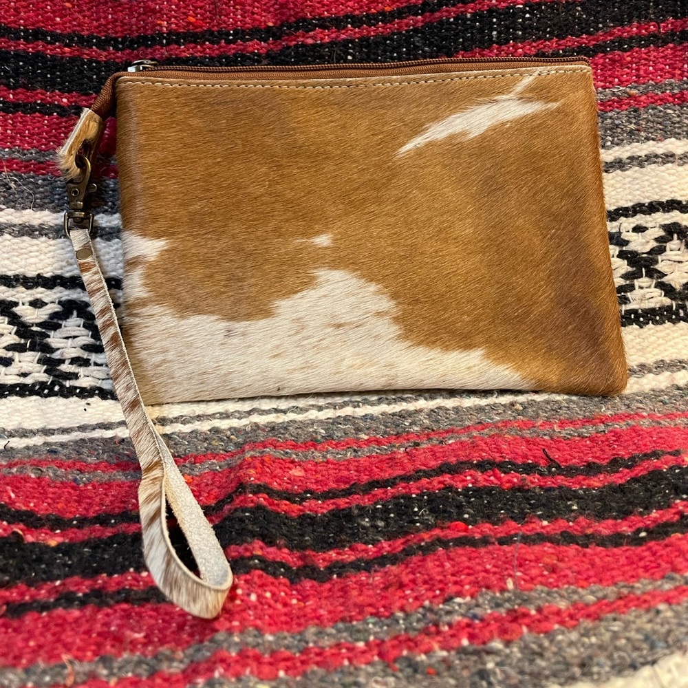 Brown and ivory cowhide/leather clutch/purse